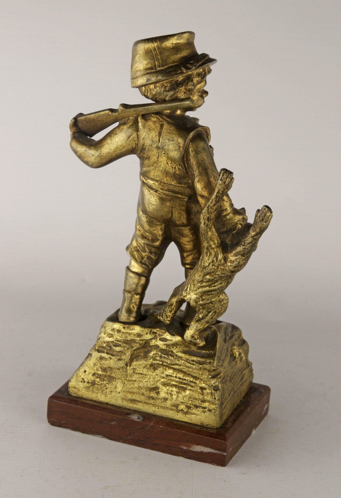 Early 20th Century Belle époque French Gilt Bronze Sculpture Of Boy Playing The Hunter Kamarad By Georges Flamand photo for sale