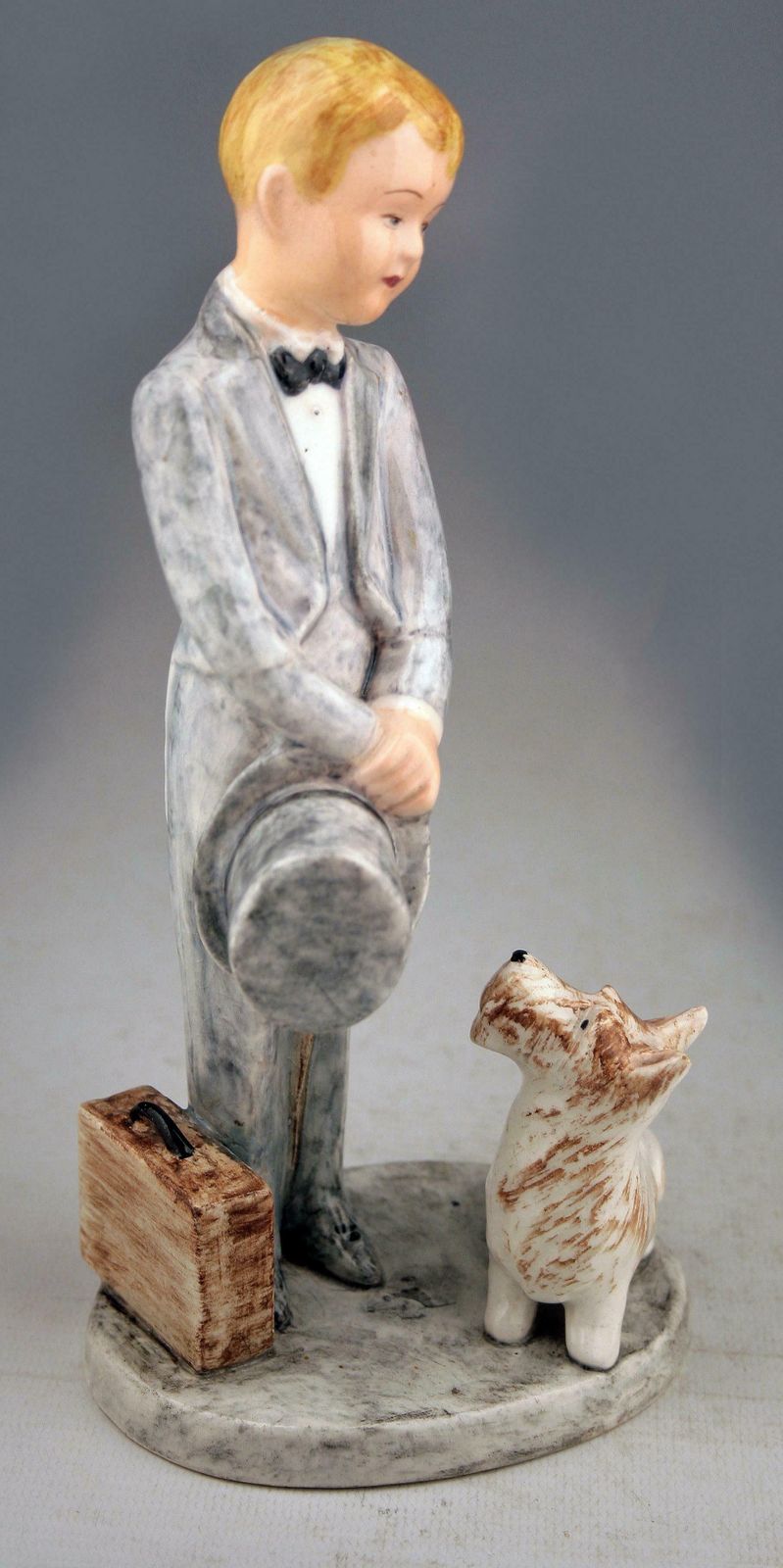 Mid 20th Century Hand Painted Glazed Porcelain Figurine Of Boy And Dog By Marcel Goldscheider For Myott Son & Co. photo for sale