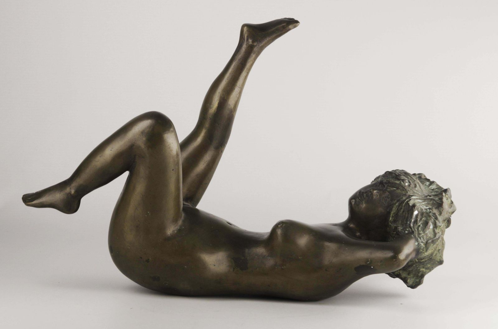 20th Century Bronze Figurative Sculpture Of A Lying Woman By Argentine Sculptor José Mariano Pagés photo furniture