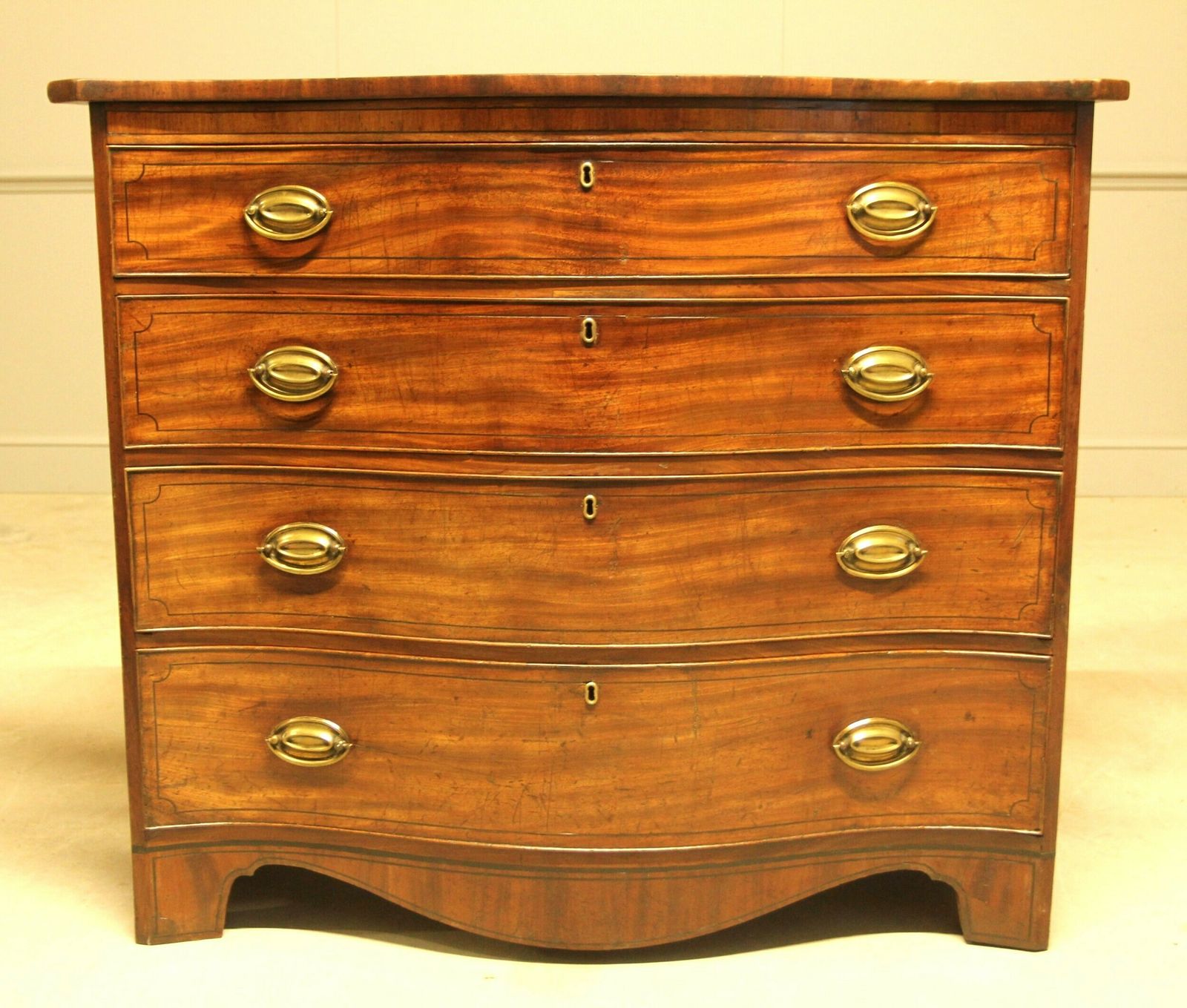 George III Serpentine Chest Of Drawers photo for sale