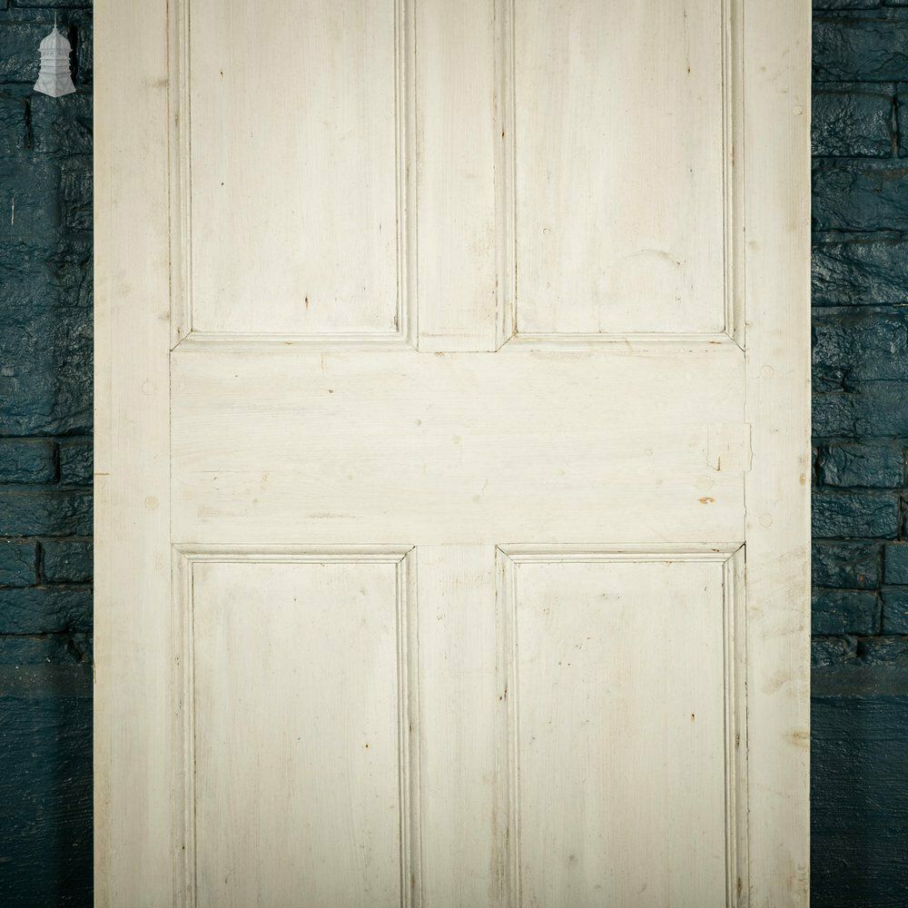 Home Fixtures Four Panel Door, White Painted Pine Paneled Door photo