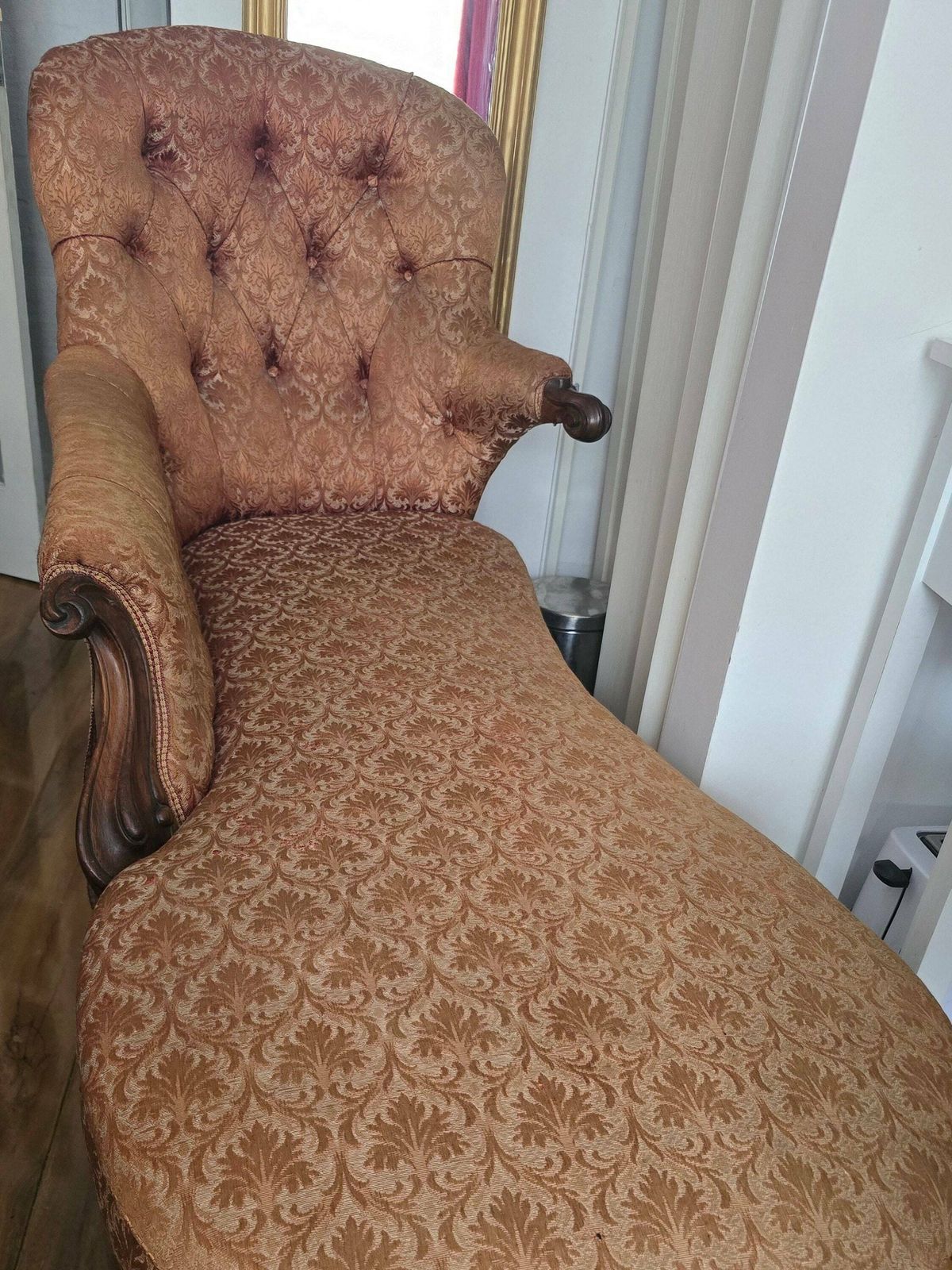 A Victorian Mahogany Show Frame Chaise Longue With Raised Back, Upholstered In Buttoned Floral Material photo for sale