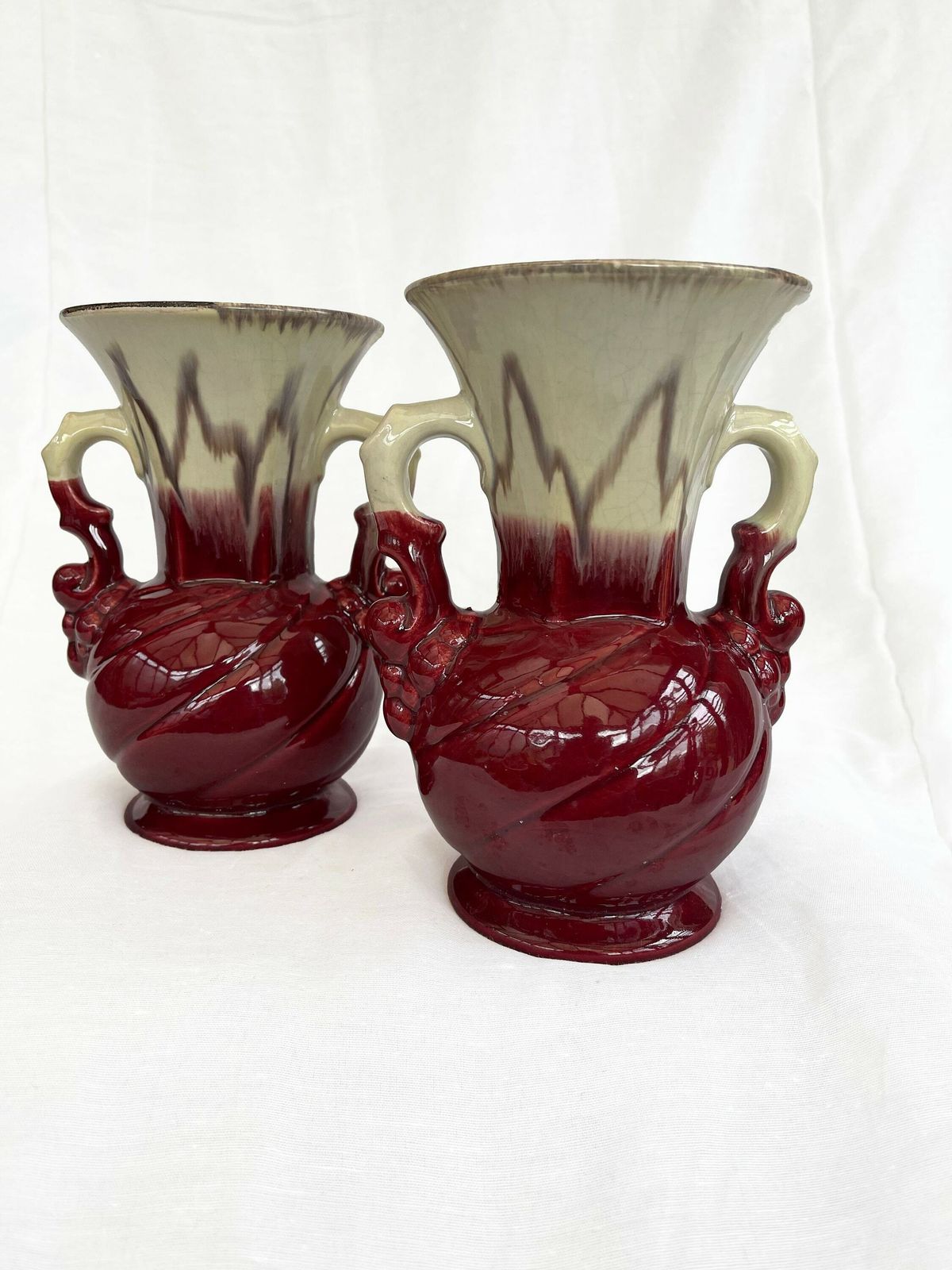 An Attractive Pair Of Mid Century Fat Lava Glaze German Handled Vases