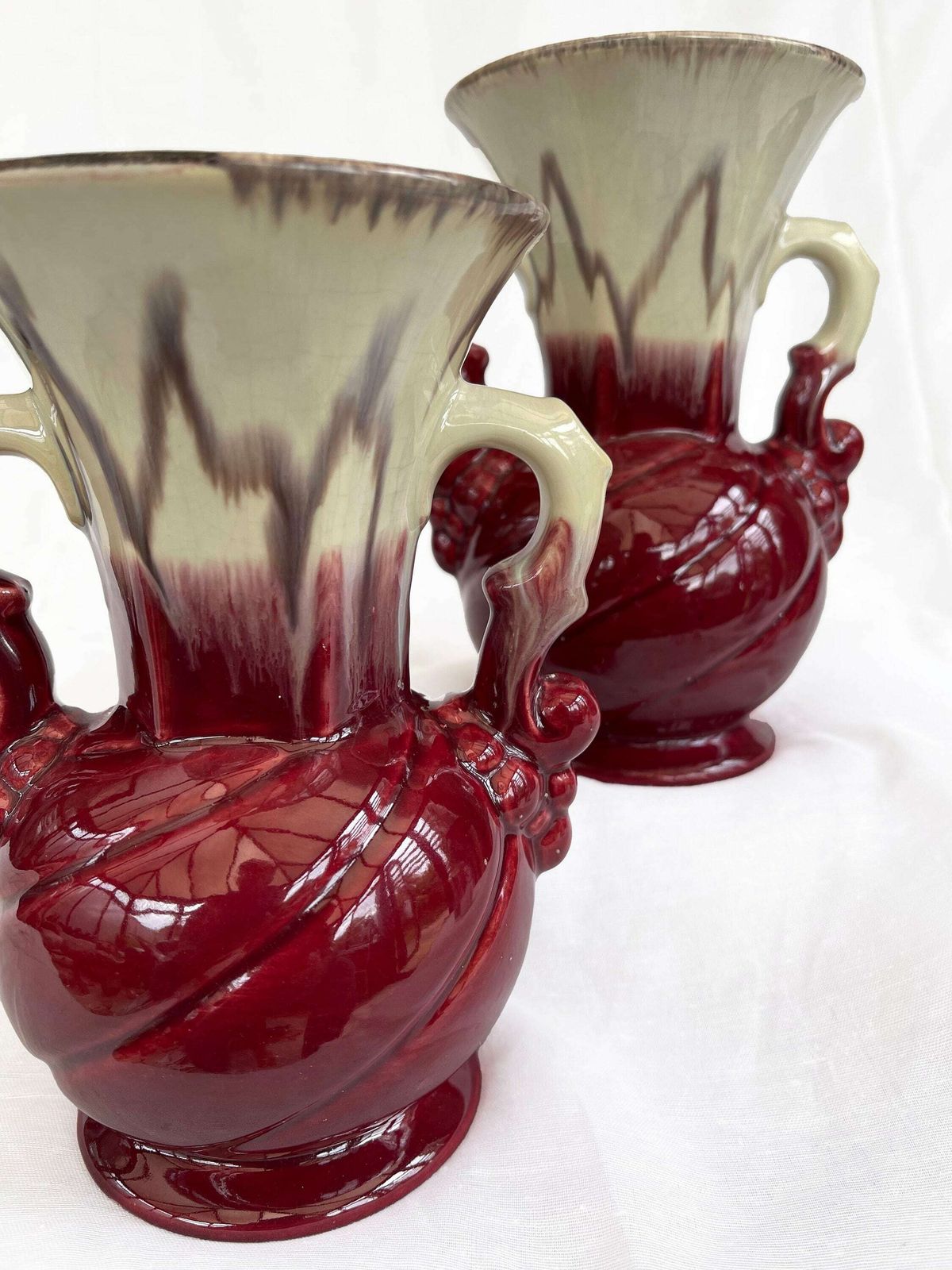 photo for sale An Attractive Pair Of Mid Century Fat Lava Glaze German Handled Vases