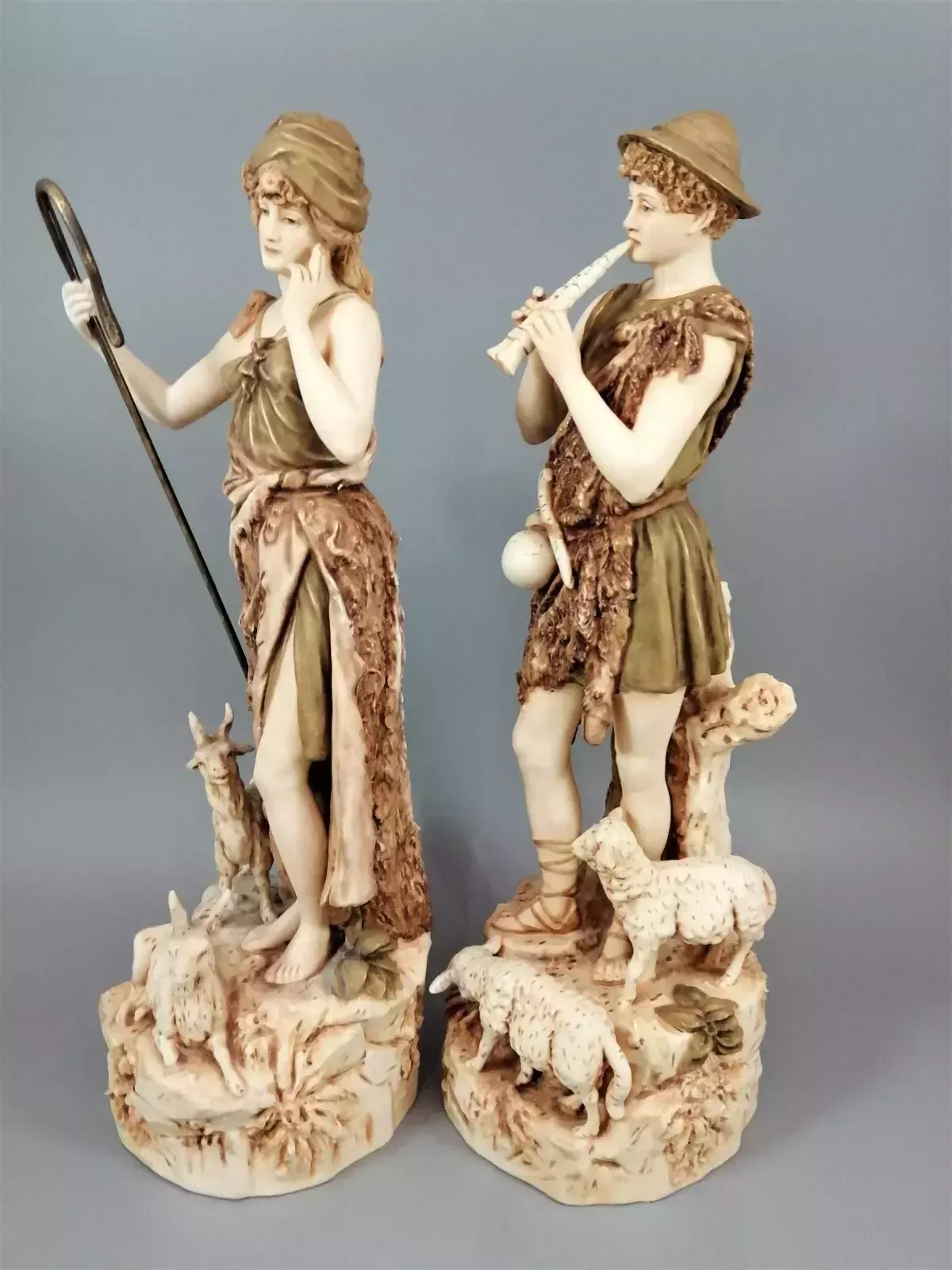 A Pair Of Shepherd And Shepherdess Statuettes Made Of Royal Dux Porcelain photo for sale