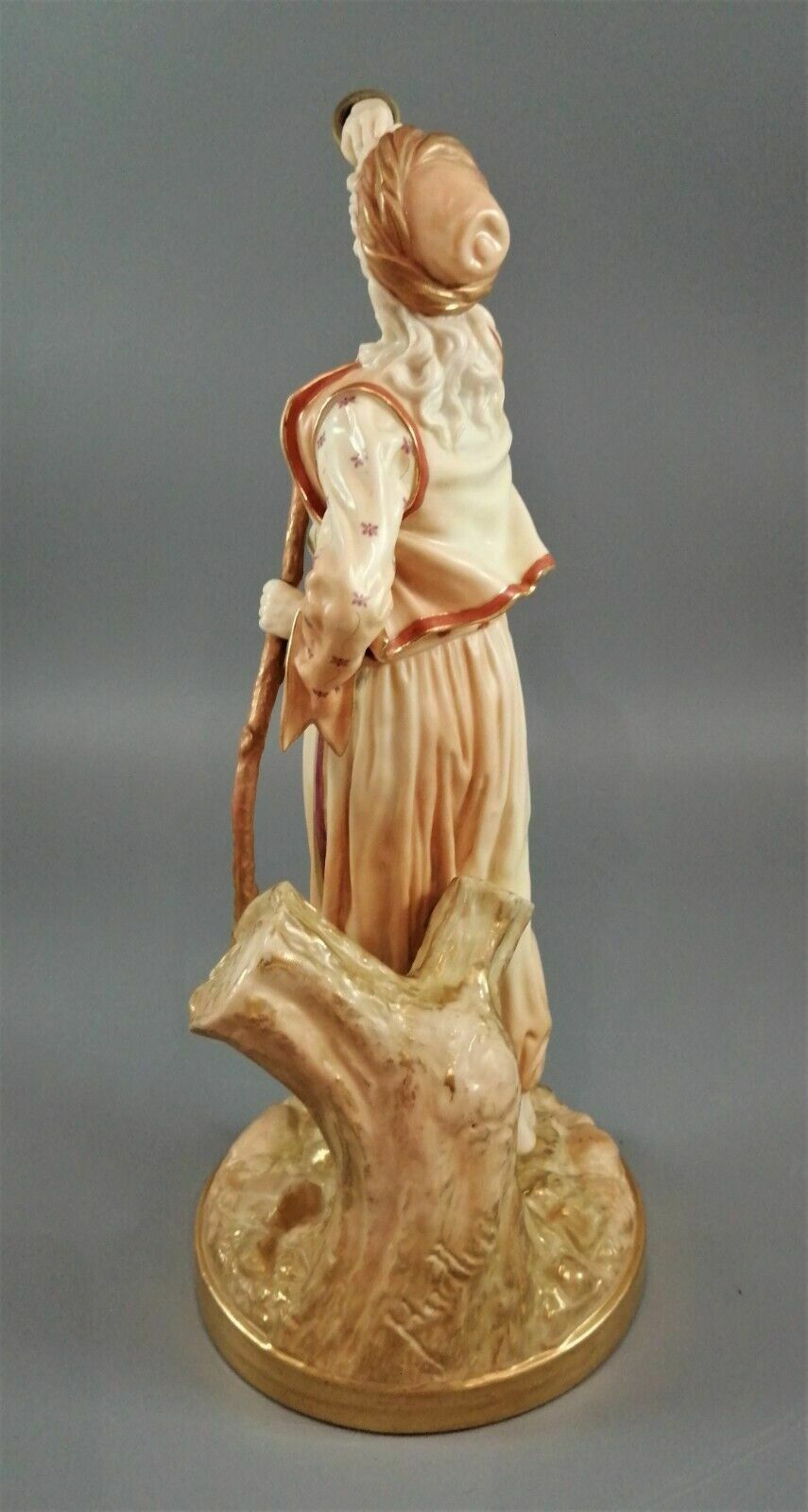 A Rare Royal Worcester Figurine Titled "The Snake Charmer," Dated 1898. photo for sale