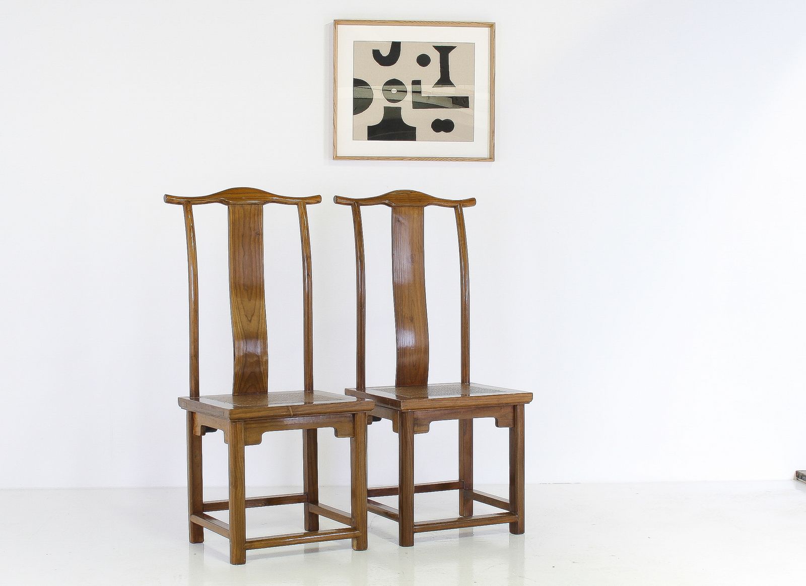 A Pair Of Lacquered Chinese Northern Elm Yoke Back ‘Officials Hat’ Chairs