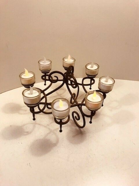 An Attractive Wrought Iron Table Centrepiece With Candleholders photo furniture
