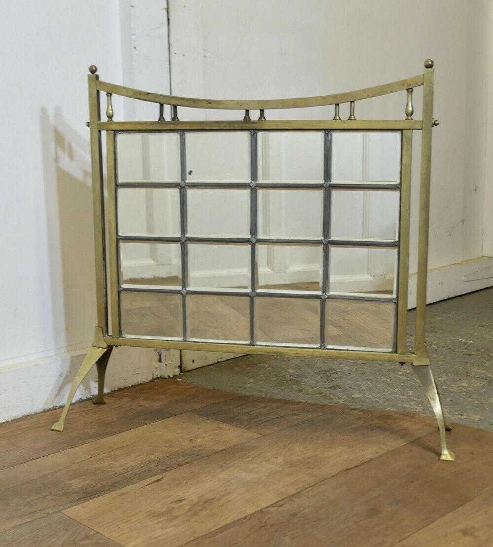 A Victorian Brass And Mirror Arts And Crafts Fire Screen photo furniture