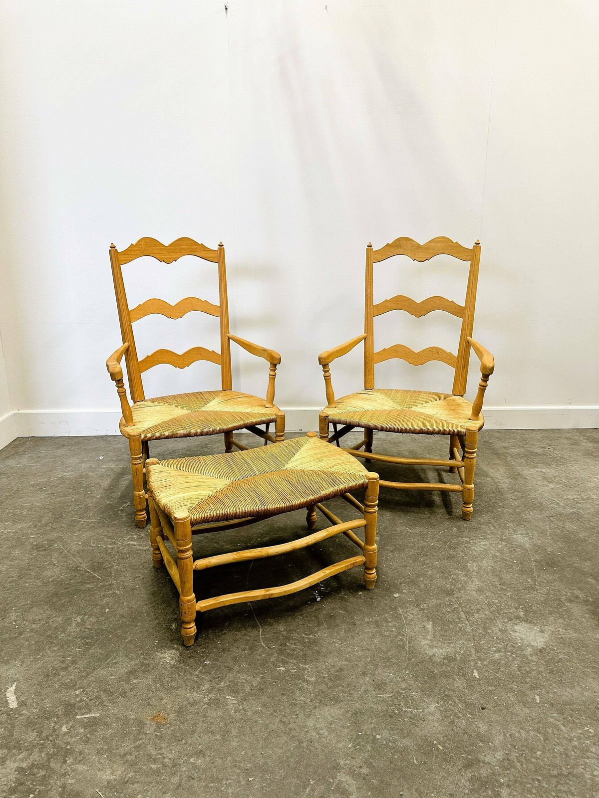 photo furniture Pair Of French Provencal Radassier Beech Chairs And Ottoman, With Rush Seating. 1970s.