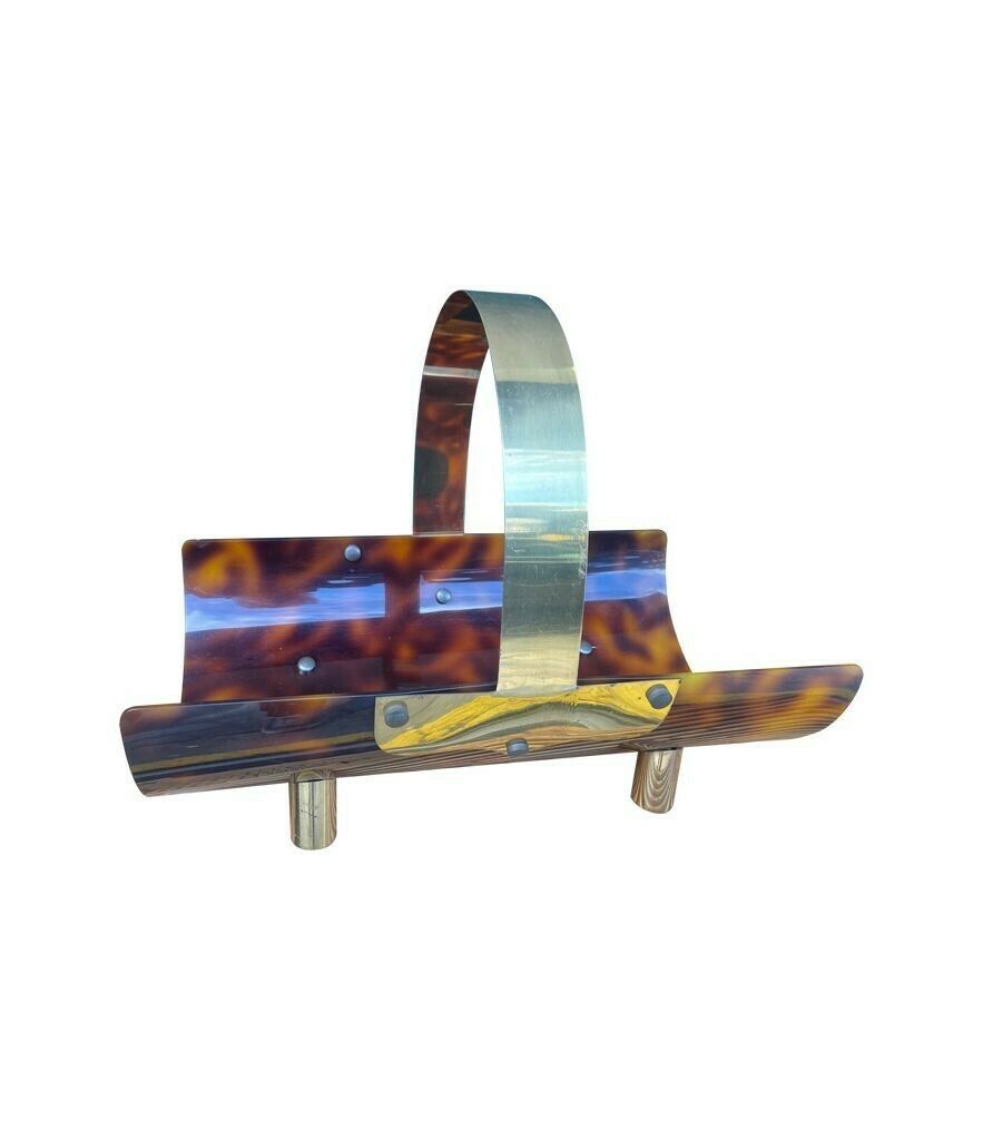625.0 An Italian 1970s Faux Tortoise Shell And Brass Magazine Rack photo