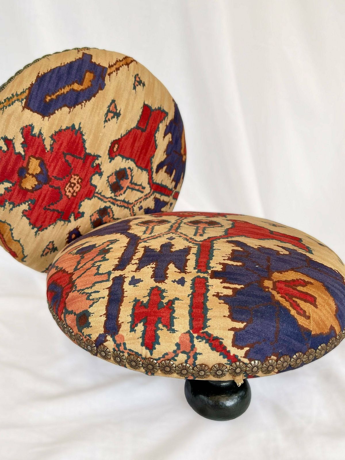 Antique French Style Foot Stools In Original Fabric With Floral Brass Flower Stud Detailing And Three Wooden Bun Feet To Base. photo vintage