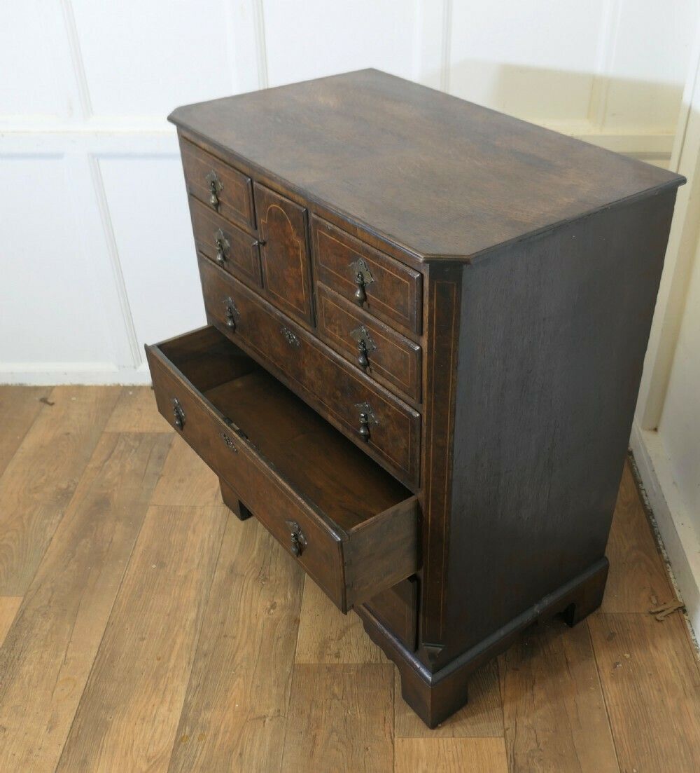 A Fine Bur Walnut And Oak Chest Of Drawers photo buy