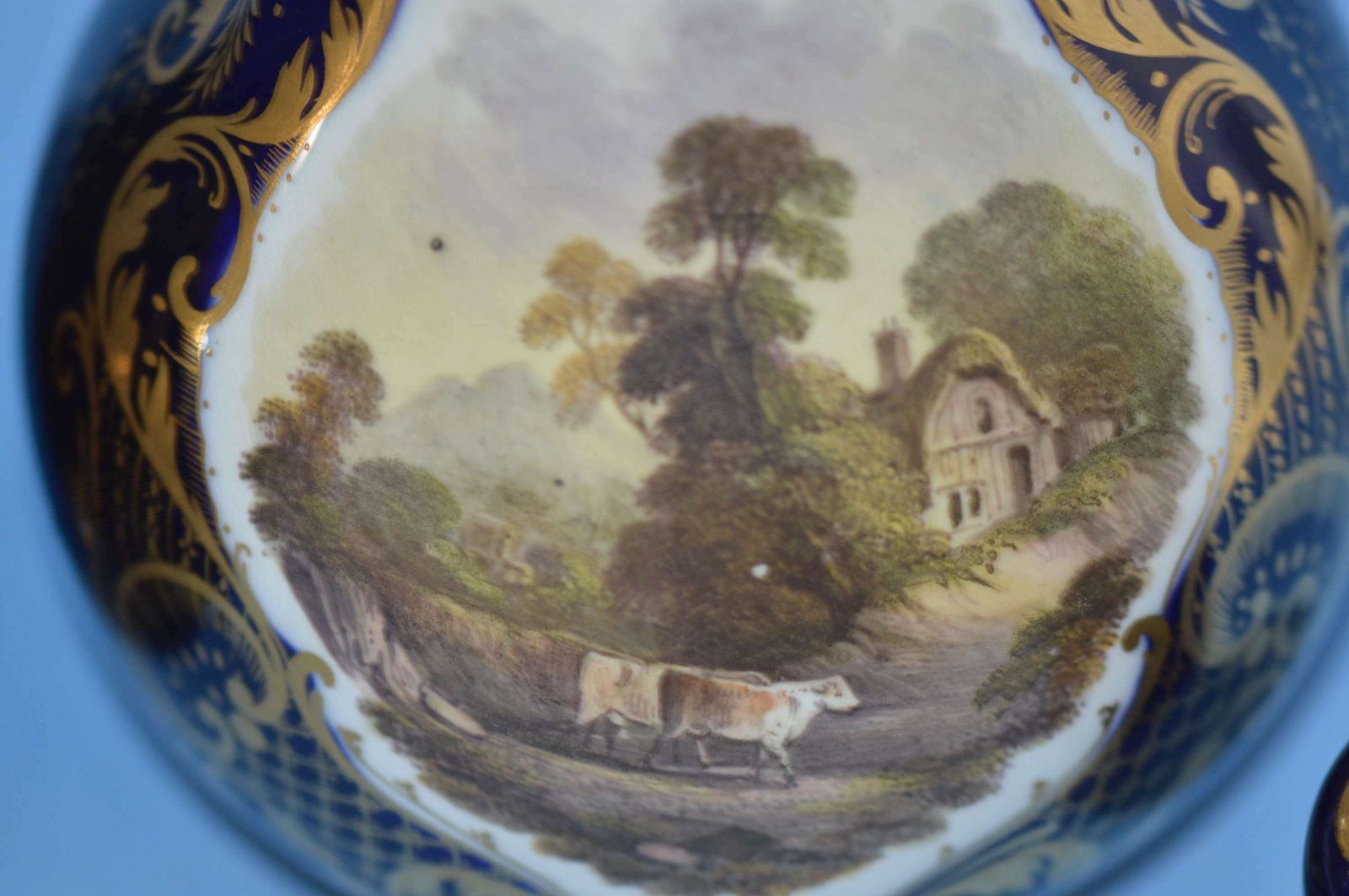 A Pair Of C1830 Derby Porcelain Blue Ground Bottle Vases And Covers photo for sale