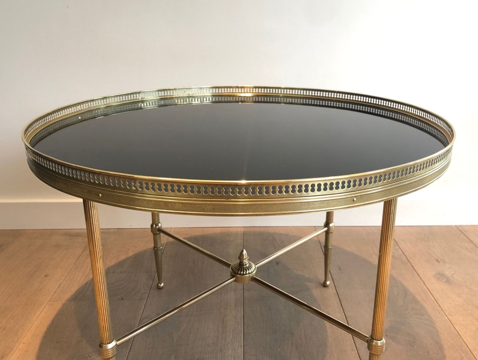 Round Coffee Table In Brass And Black Lacquered Glass Top By Maison Jansen photo for sale