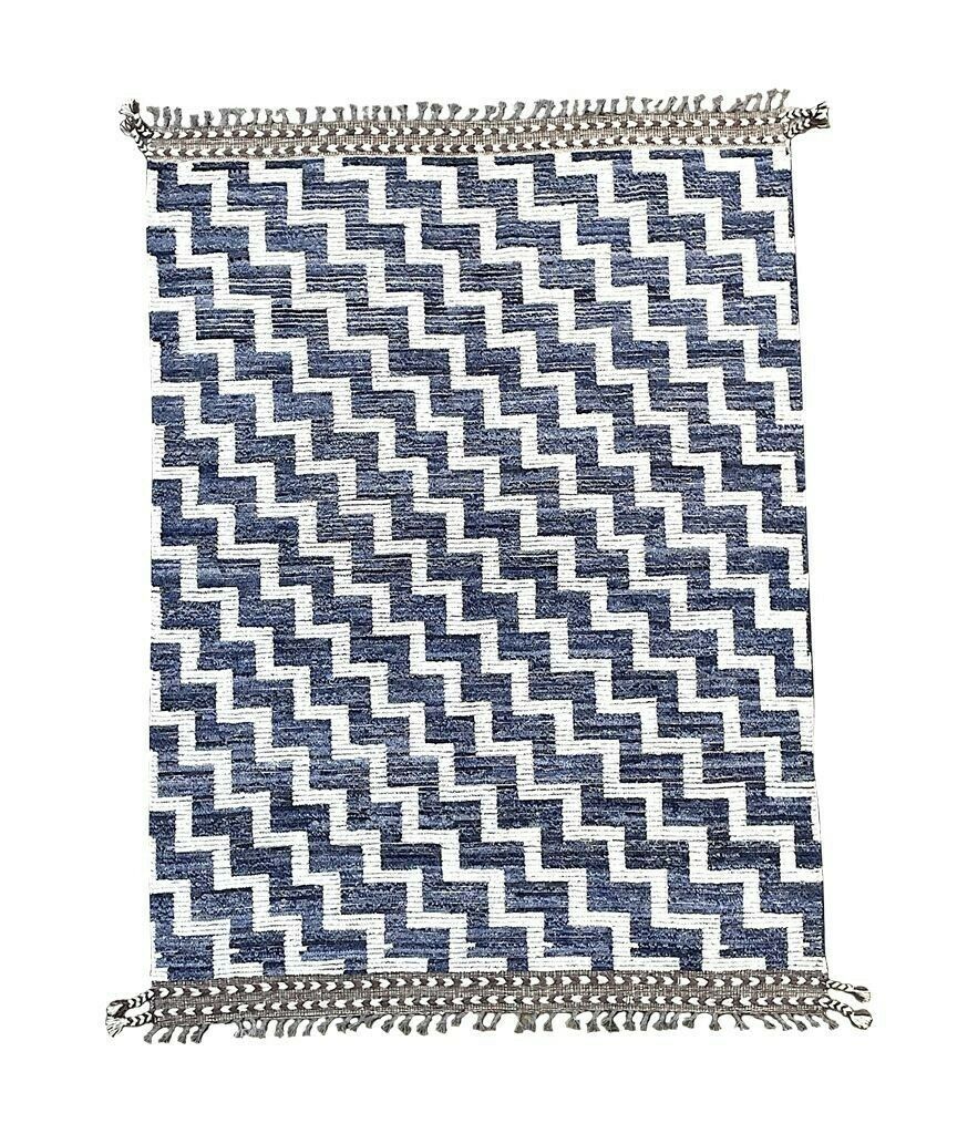 A Handmade Morrocan Beni Ourain Berber Rug With Blue And White Stepped Design.