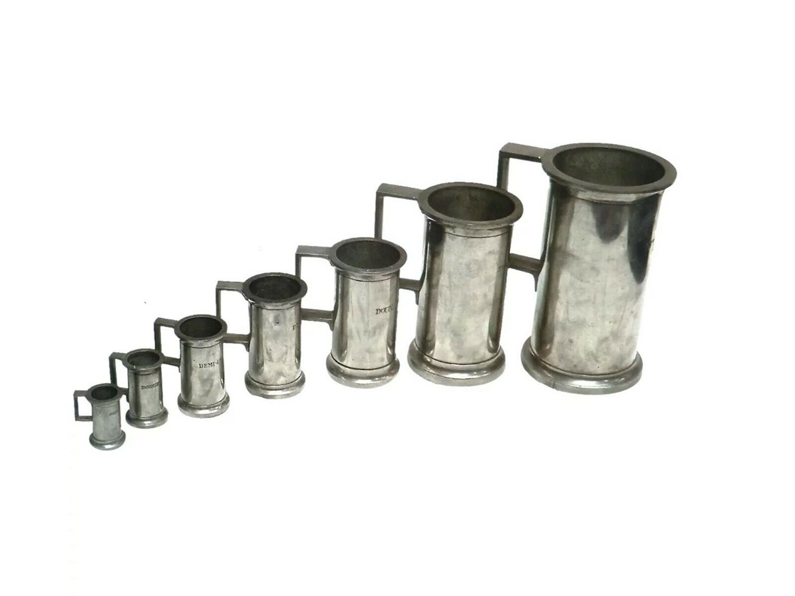 Set Of Antique Pewter Spirit Measures From France photo furniture