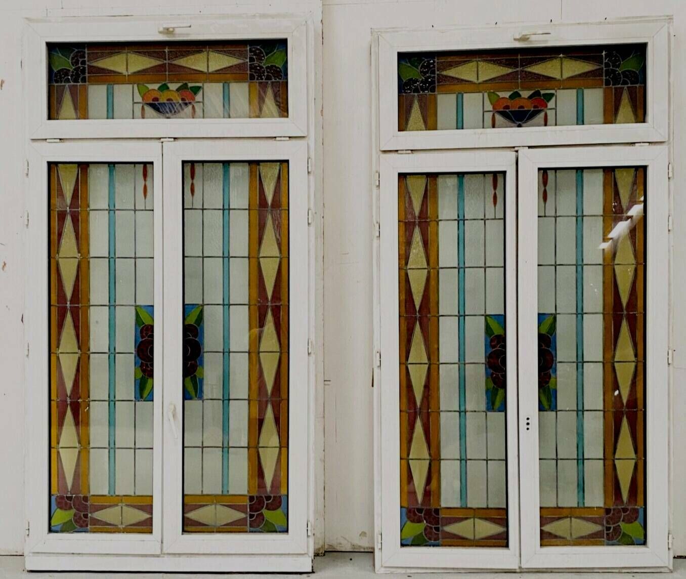 photo for sale Pair Of Two Leaf Windows In 20th Century Art Deco Stained Glass