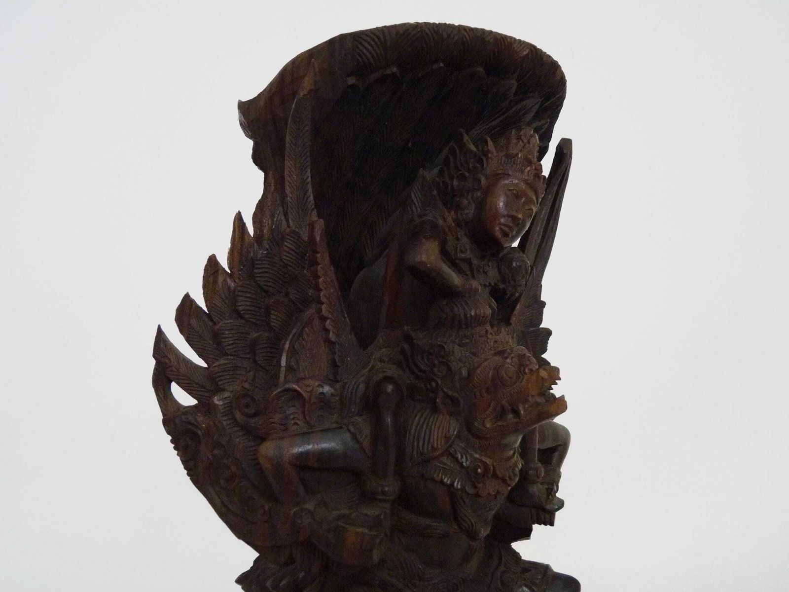 Carved Wooden Statue Of Vishnu Riding Garuda. Bali Indonesia. 1930s photo for sale