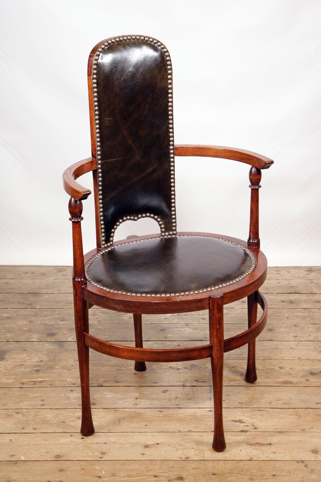 A Js Henry Oval Armchair Restored & Upholstered In Yarwood Leather