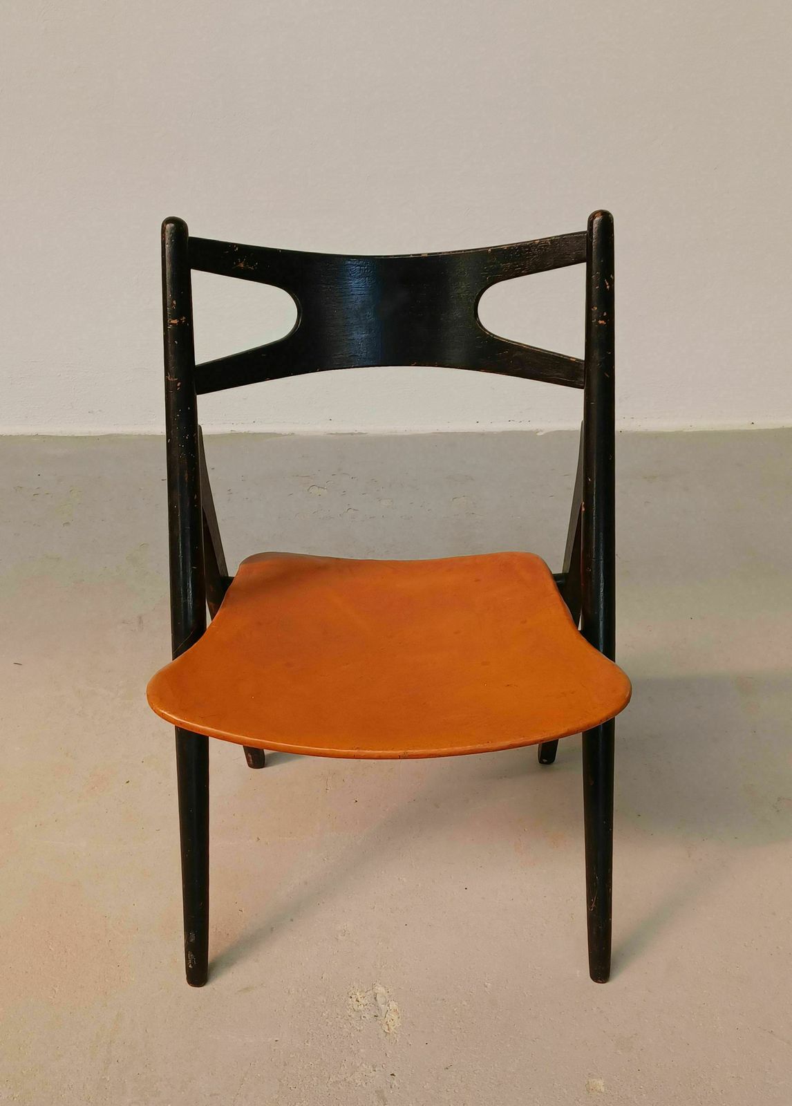 Patinated Hans Wegner Sawbuck Chair With Original Leather 1950s photo for sale