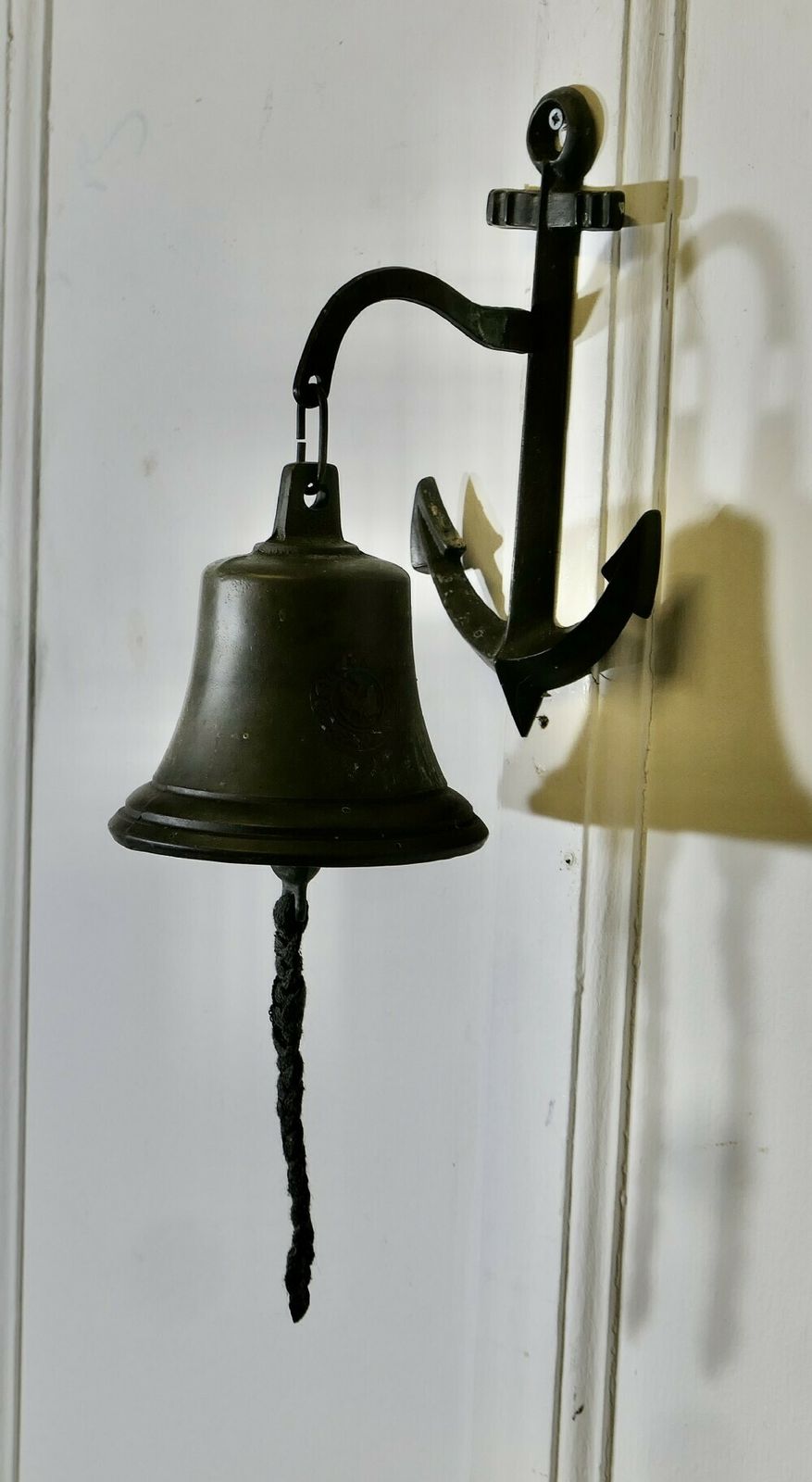Wall Hanging Bronze Door Bell On An Anchor photo furniture