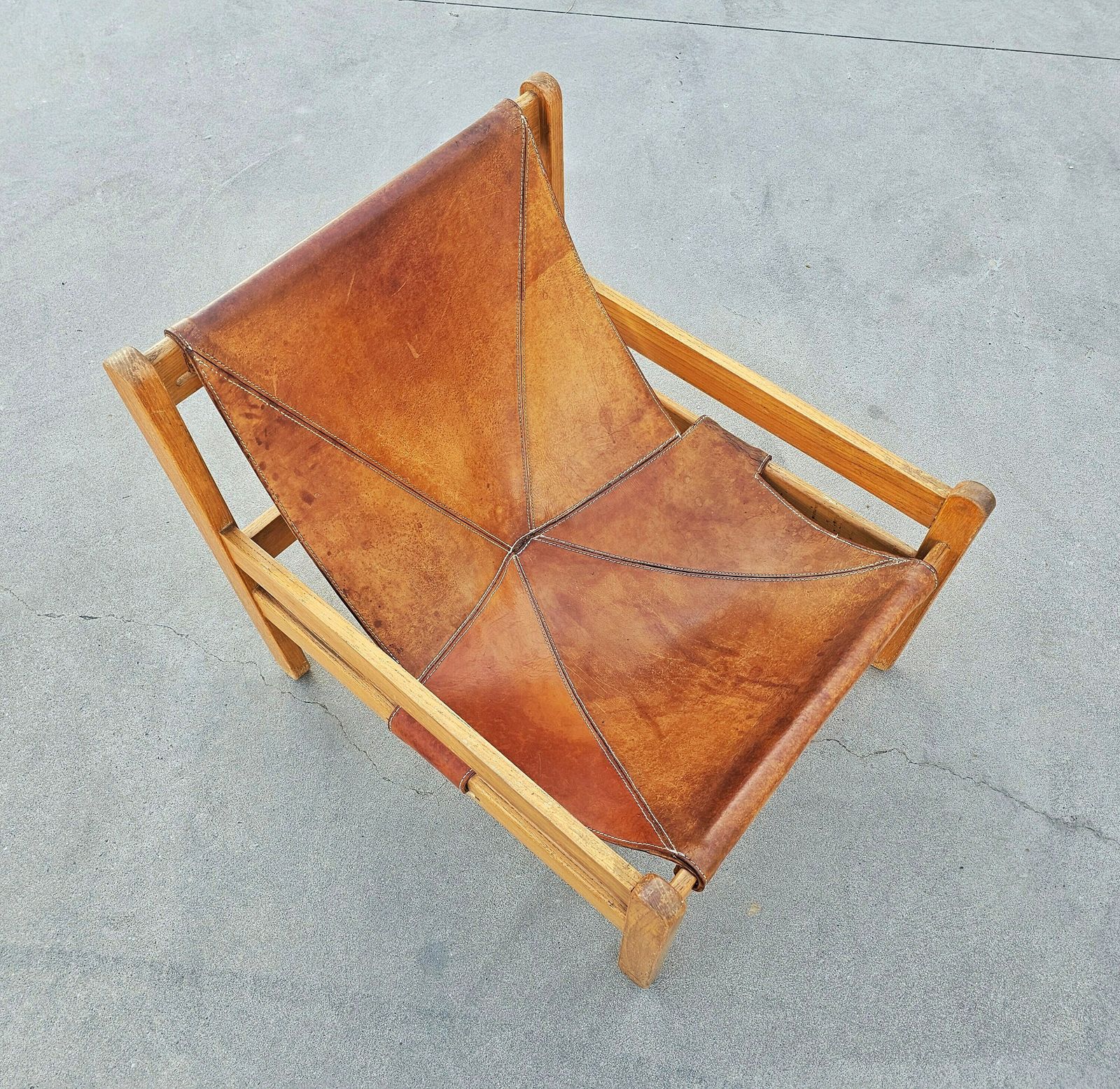 photo for sale Brazilian Mid Century Modern Cognac Leather Sling Chair With Beautiful Patina // Made In Brazil In 1970s