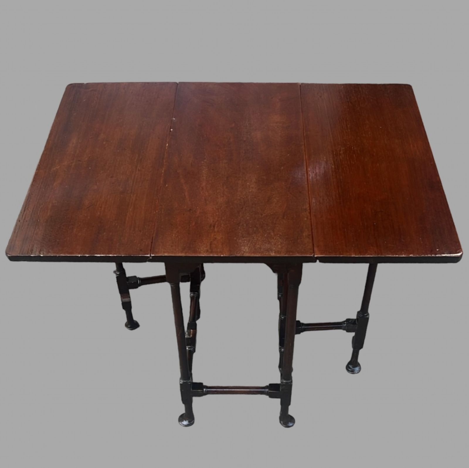 A 19th Century Mahogany Small Sized Spider Legged Sutherland Table photo furniture