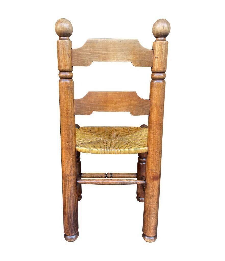 photo furniture A Set Of Four 1940s Oak And Woven Rope Seat Chairs By Charles Dudouyt