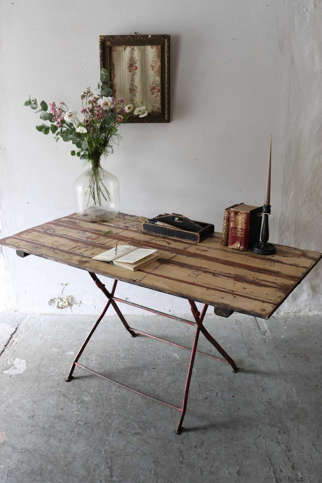 Striking Vintage French Trestle Table Or Desk With Attractive Painted And Distressed Plank Top And Metal Folding Legs photo vinterior