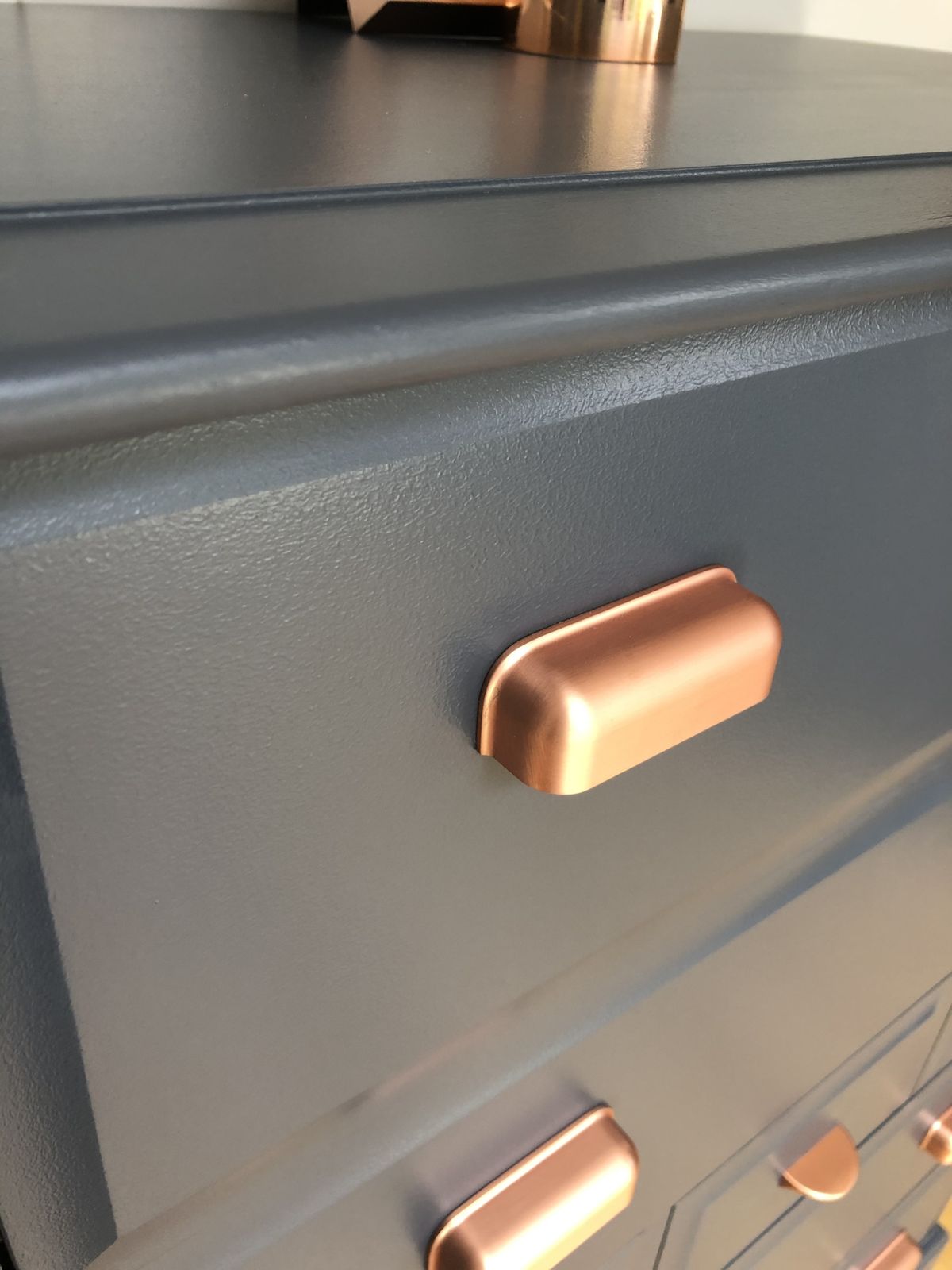 photo buy A Pair Of Stag Minstrel Tallboy Chest Of Drawers Painted Blue With Copper Handles