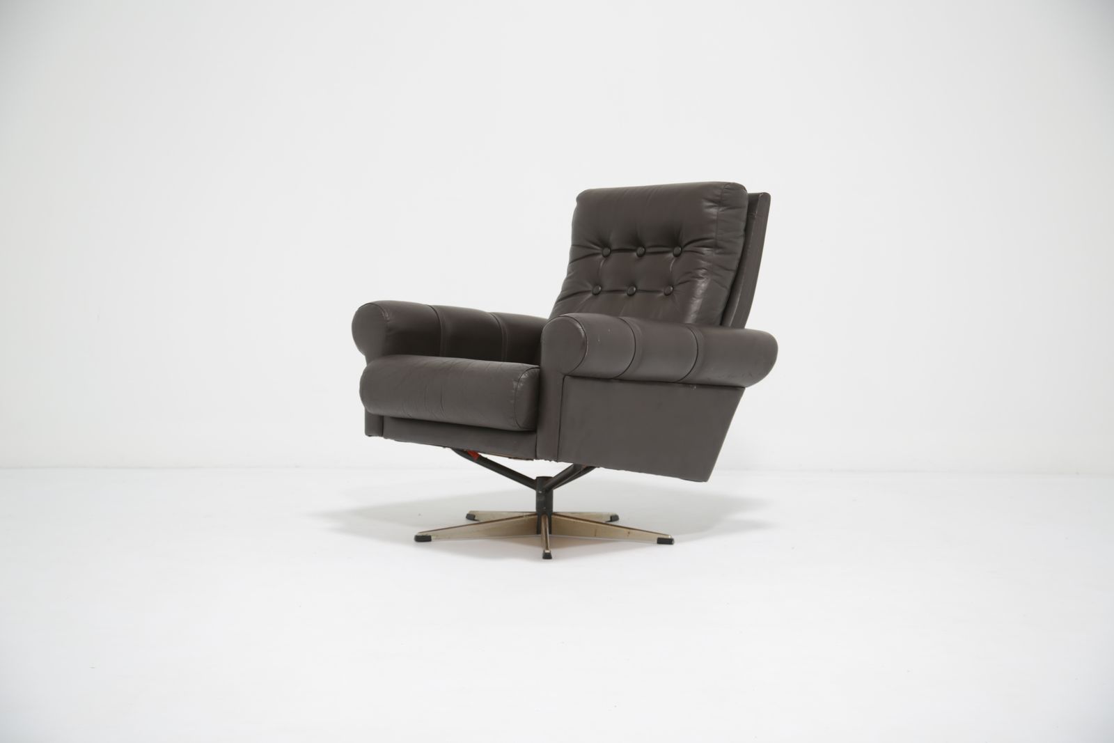 Vintage Brown Leather Swivel Armchair, Denmark, 1970s.