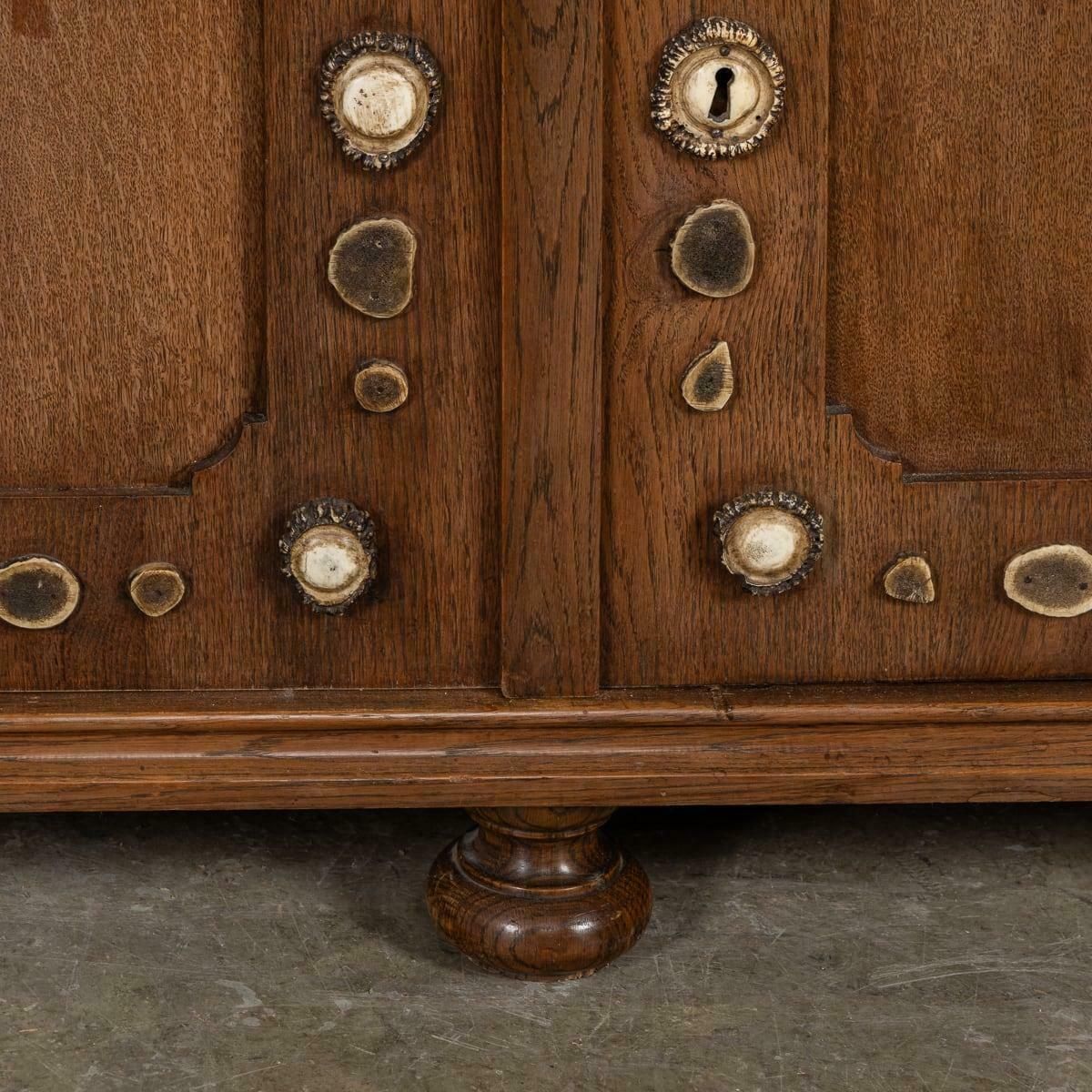 photo buy Antique 20th Century German Black Forest Oak & Antler Cabinet C.1900