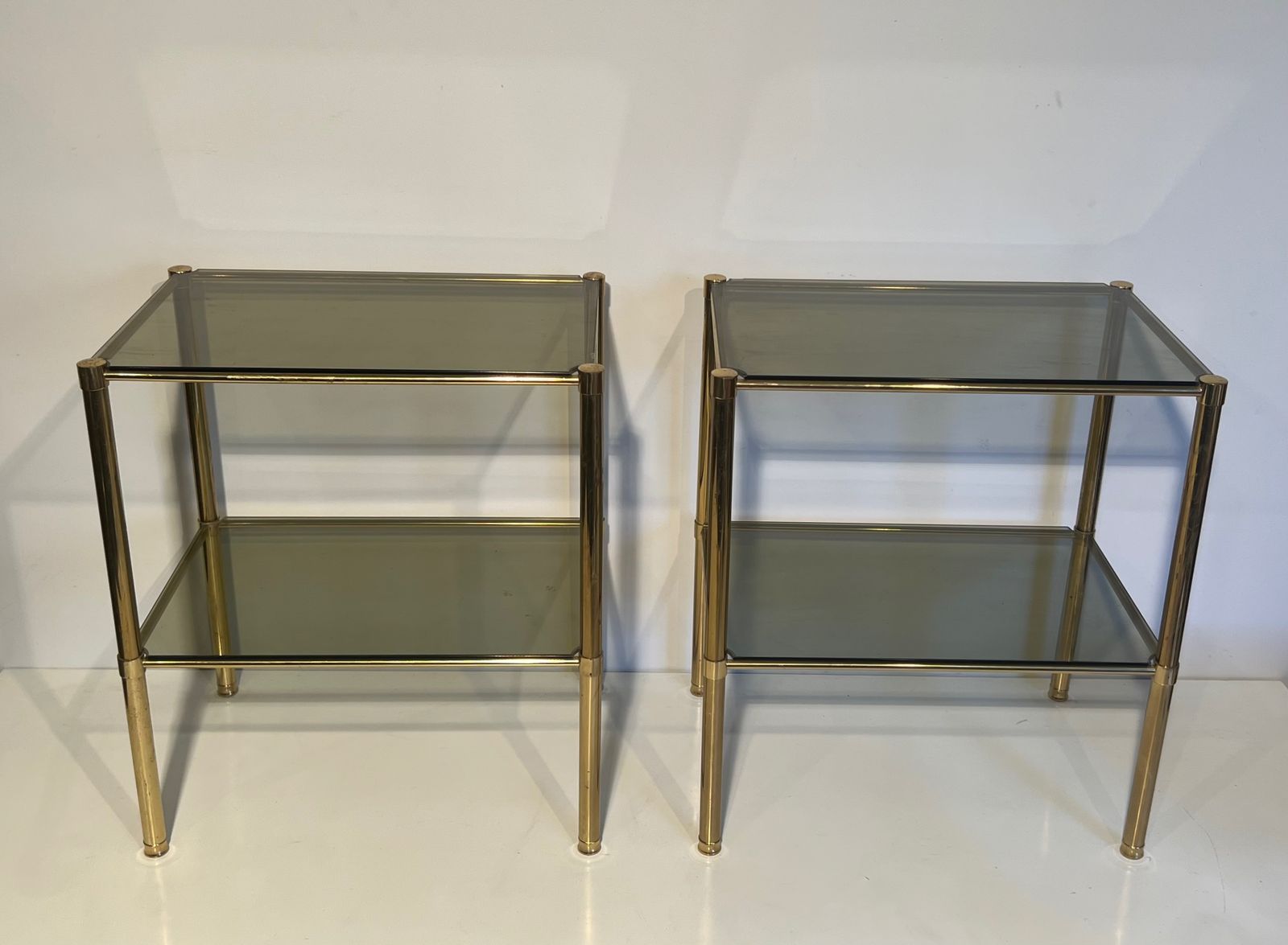 Pair Of Brass End Tables With Smoked Glass Trays. Circa 1970