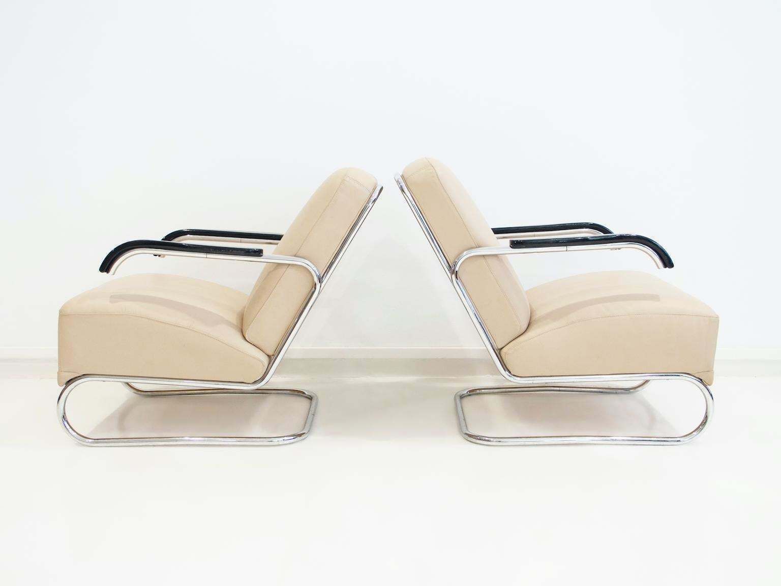 Pair Of Beige Leather And Tubular Steel Lounge Chairs photo vinterior