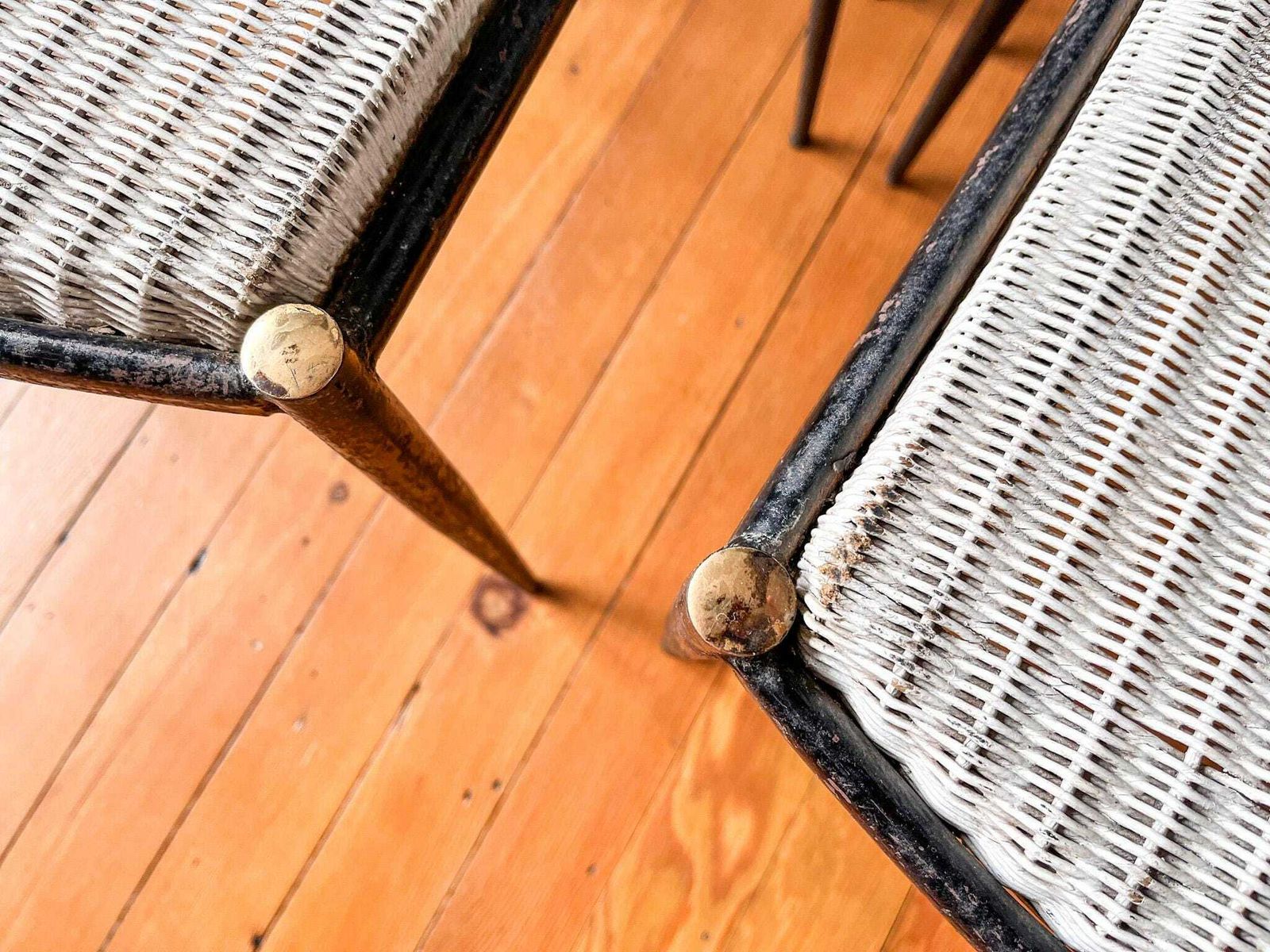 photo furniture A Set Of Four Mid Century Metal And Wicker Dining Chairs By Lloyd Loom