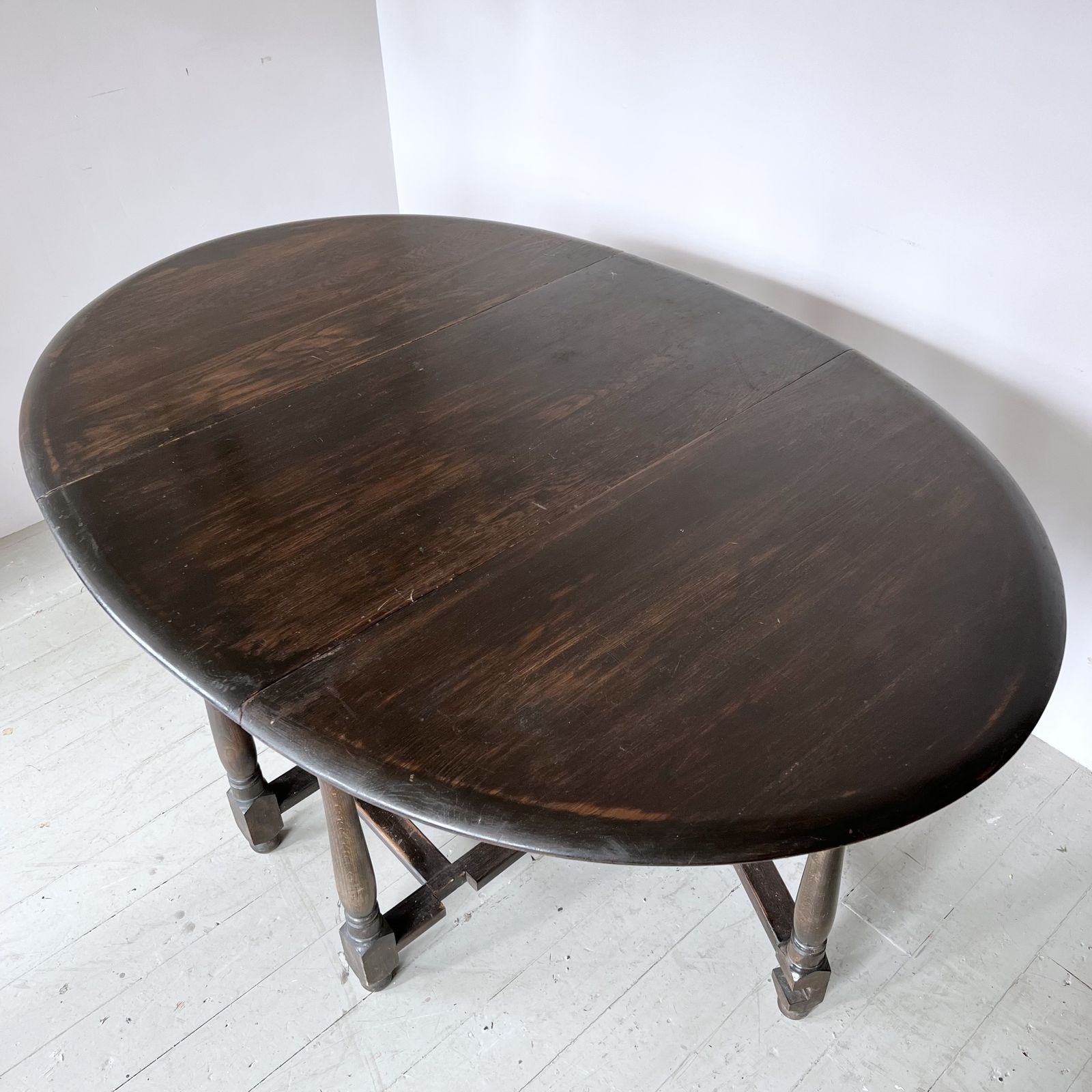 Dark Stained Solid Wood Oval Drop Leaf Table photo Furniture