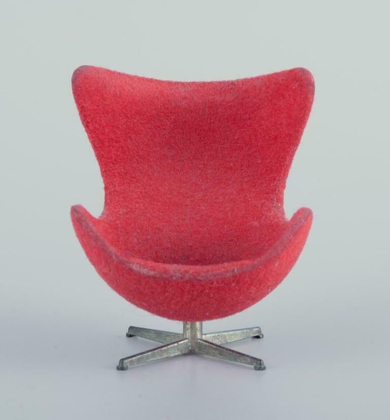 Miniatures Of The "Swan" And "Egg" Chairs, Designed By Arne Jacobsen. photo furniture