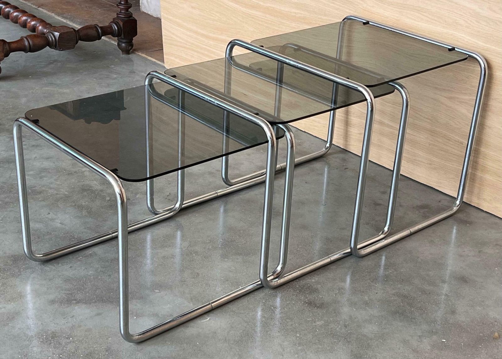 photo furniture Cantilevered Chrome & Glass Nesting Tables With Fume Glasses