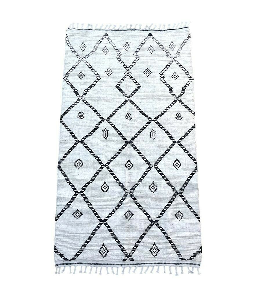 A Vintage Handwoven Moroccan Berber Rug With Tribal Diamond And Line Pattern
