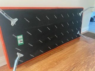 photo for sale Mid Century Danish Style Long Bench. Orange Vinyl Upholstery And Stainless Steel Legs. Orangebox.