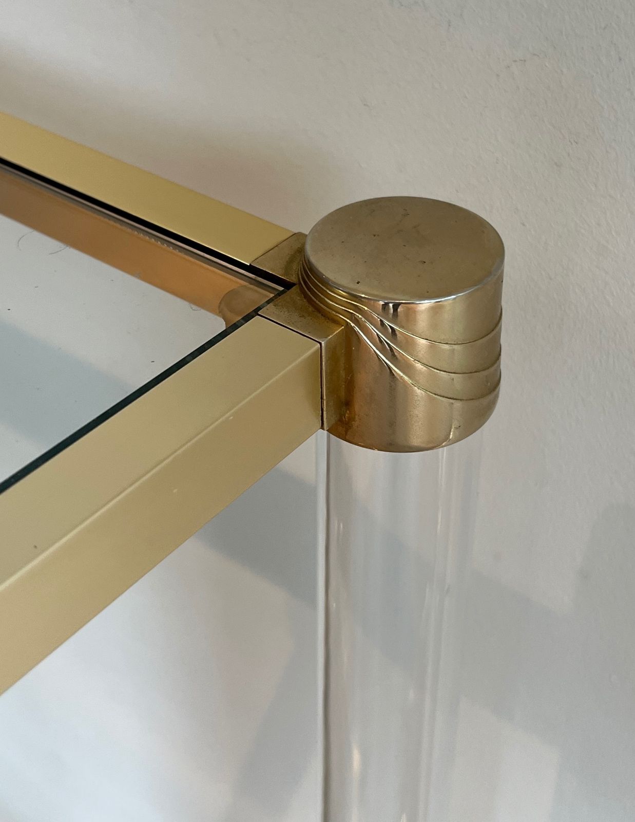 photo furniture Console In Plexiglass And Golden Metal. Circa 1970