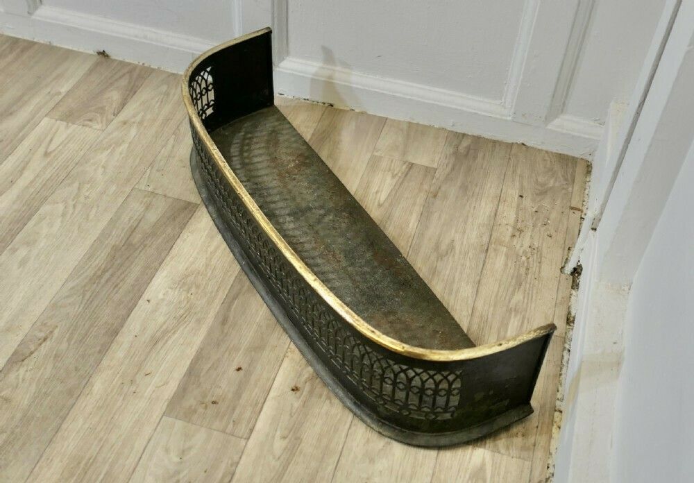 A Petite Victorian Pierced Brass And Iron Fender photo Home Fixtures