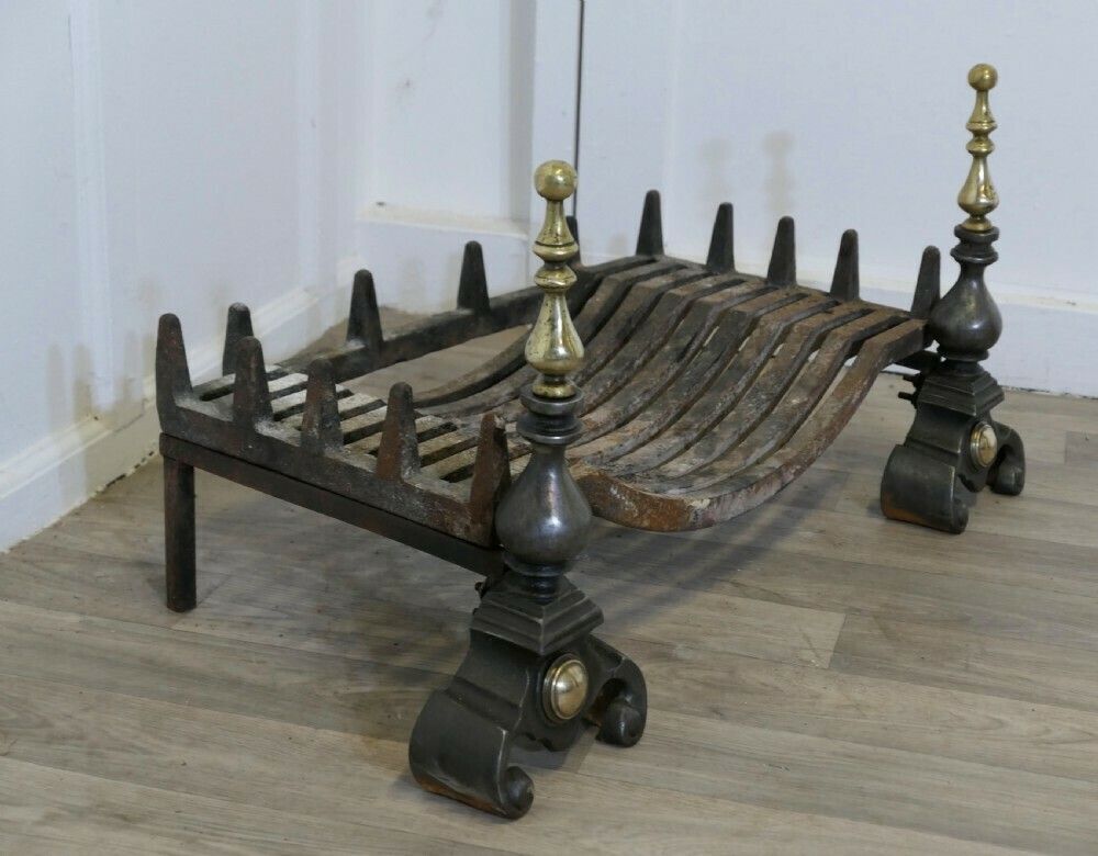 Large Polished Steel And Brass Log Grate On Andirons photo vinterior