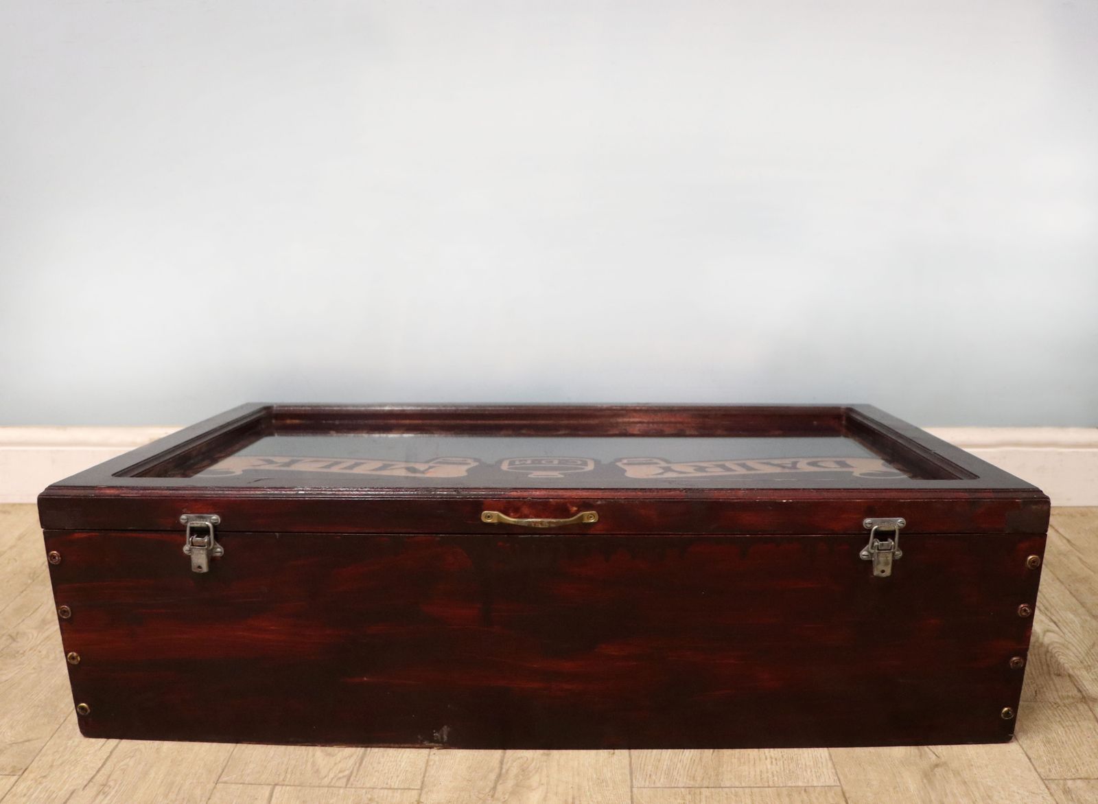 A Superb Wedge Shaped Countertop Display Cabinet, Later Hand Sign Written For Cadburys Dairy Milk Chocolate. photo for sale