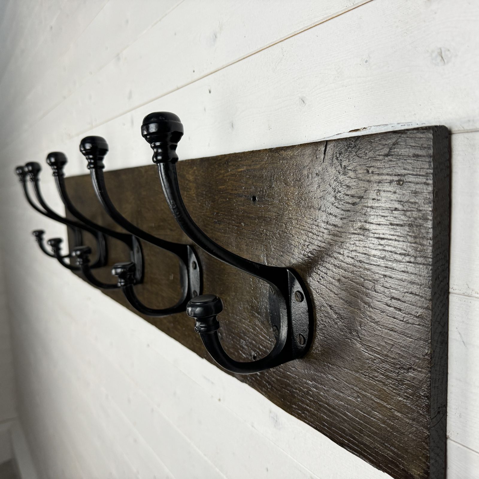 Set Of 5 Victorian Style Coat And Hook Hats On Antique Oak Board photo for sale