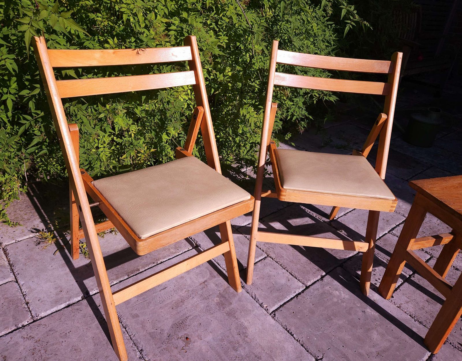 Pair Of Mid Century Beechwood Folding Chairs With Cream Vinyl Seats