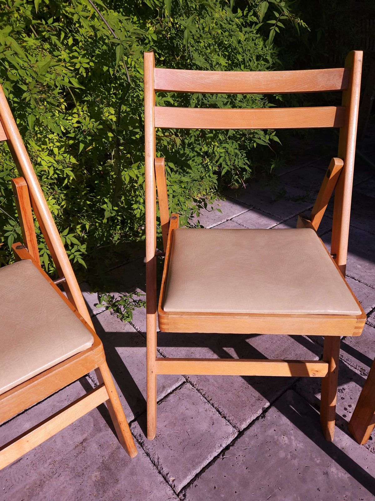 Pair Of Mid Century Beechwood Folding Chairs With Cream Vinyl Seats photo for sale