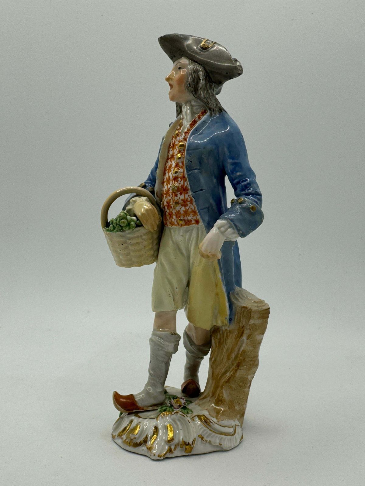 18th Century Meissen Figure 'Street Trader Selling Grapes' photo furniture