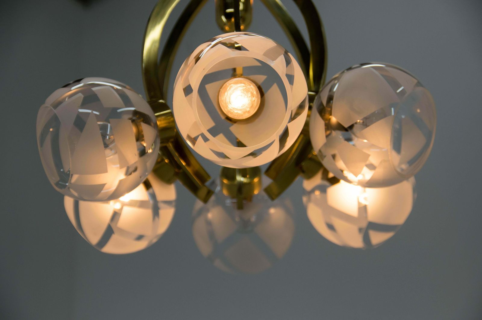 photo furniture Brass And Glass 6 Flamming Chandelier, 1980s